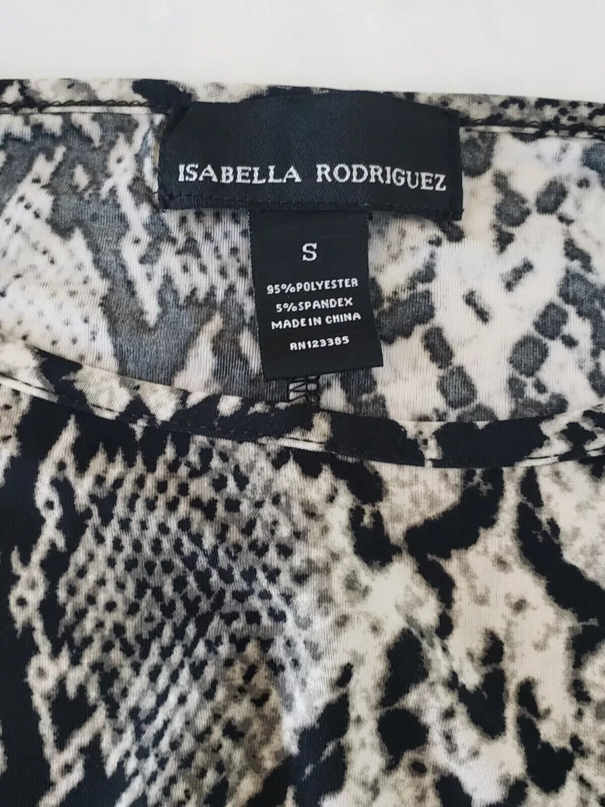 Snakeskin print blouse by isabella rodriguez. Ruched/elastic waist size Small